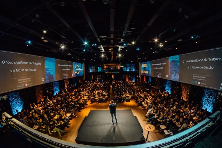 A leader speaking at a conference