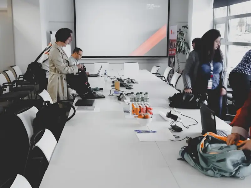 Business leaders in a strategy meeting around a boardroom table